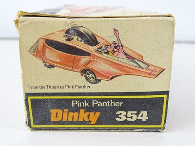 Lot 154 - A DINKY Toys 354 Pink Panther car - G/VG in...