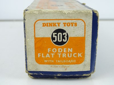 Lot 156 - A DINKY Toys 503 Foden Flat Truck with...