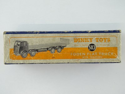 Lot 156 - A DINKY Toys 503 Foden Flat Truck with...