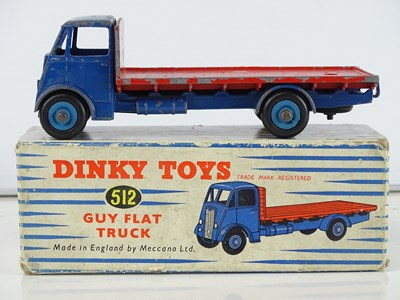 Lot 158 - A DINKY Toys 512 Guy Flat Truck - with dark...