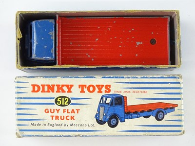 Lot 158 - A DINKY Toys 512 Guy Flat Truck - with dark...