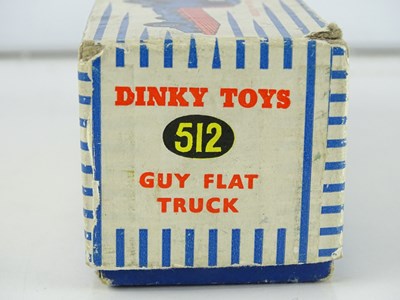 Lot 158 - A DINKY Toys 512 Guy Flat Truck - with dark...