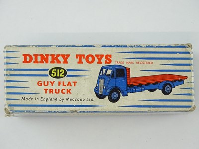 Lot 158 - A DINKY Toys 512 Guy Flat Truck - with dark...