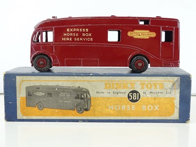 Lot 161 - A DINKY Toys 581 Horsebox in BR maroon livery -...