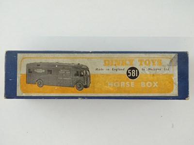 Lot 161 - A DINKY Toys 581 Horsebox in BR maroon livery -...