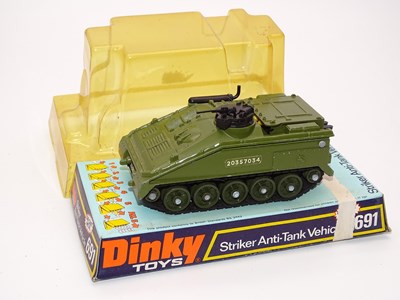 Lot 166 - A DINKY Toys 691 - Striker Anti-Tank Vehicle -...