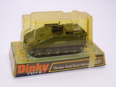 Lot 166 - A DINKY Toys 691 - Striker Anti-Tank Vehicle -...