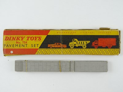 Lot 168 - A DINKY Toys 754 Pavement Set (contains 14...