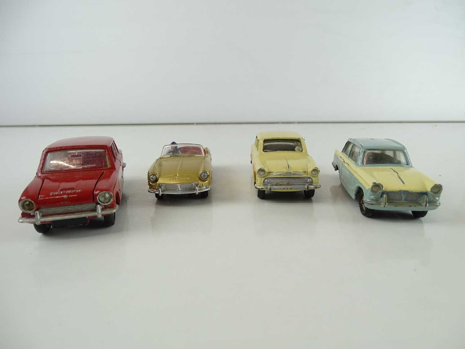 Lot 177 - A group of DINKY Cars from the 1960s...