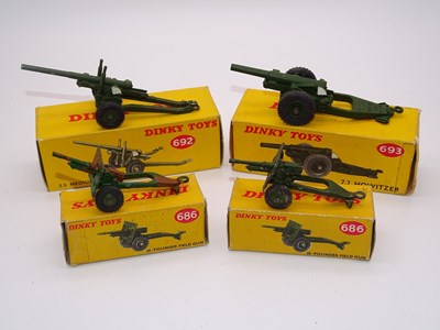 Lot 180 - A group of DINKY Toys Military Guns -...