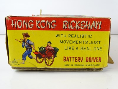 Lot 199 - A group of plastic and tinplate battery...