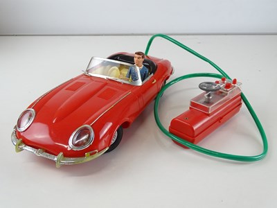 Lot 220 - A LOUIS MARX battery operated remote control...