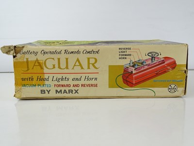 Lot 220 - A LOUIS MARX battery operated remote control...