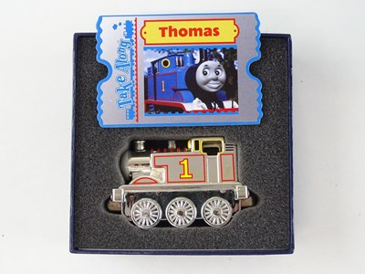 Lot 232 - An RC2 "Take Along" Thomas the Tank Engine toy,...