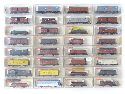 Lot 258 - A group of N gauge European outline wagons by...