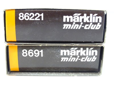 Lot 317 - A pair of MARKLIN Z Gauge German Outline wagon...