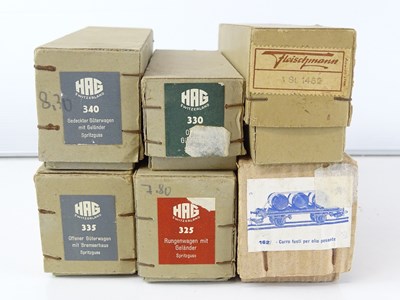 Lot 336 - A group of vintage HO wagons by POCHER, HAG...