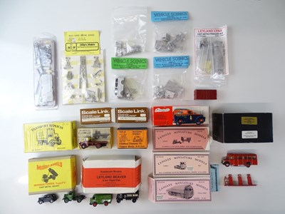 Lot 363 - A group of built and unbuilt white metal kits...