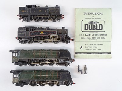 Lot 395 - A group of playworn HORNBY DUBLO 3-rail steam...