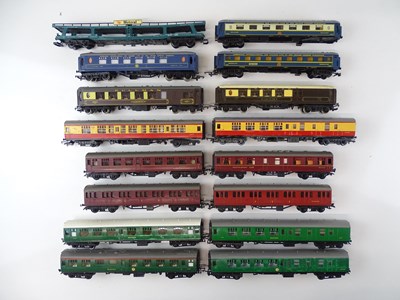 Lot 518 - A quantity of unboxed coaches by TRI-ANG,...