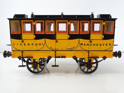 Lot 566 - A HORNBY 3.5 inch gauge G104 coach and G102...