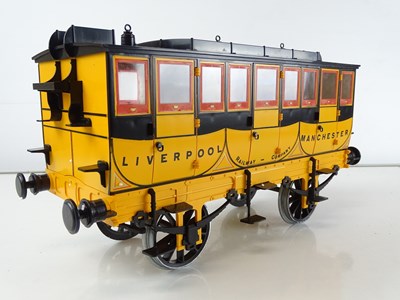 Lot 566 - A HORNBY 3.5 inch gauge G104 coach and G102...