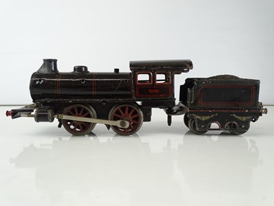 Lot 586 - A MARKLIN O Gauge Clockwork steam locomotive...