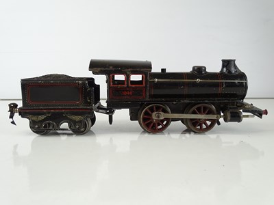 Lot 586 - A MARKLIN O Gauge Clockwork steam locomotive...