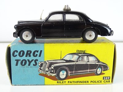 Lot 77 - A CORGI Toys 209 Riley Pathfinder Police car -...