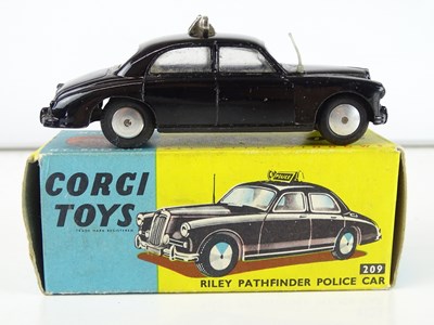 Lot 77 - A CORGI Toys 209 Riley Pathfinder Police car -...