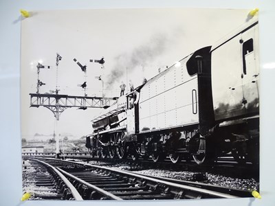 Lot 100 - A quantity of large format black/white...