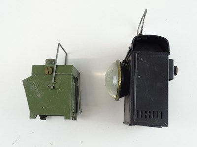 Lot 123 - A pair of Railway hand lamps - one marked LMS,...