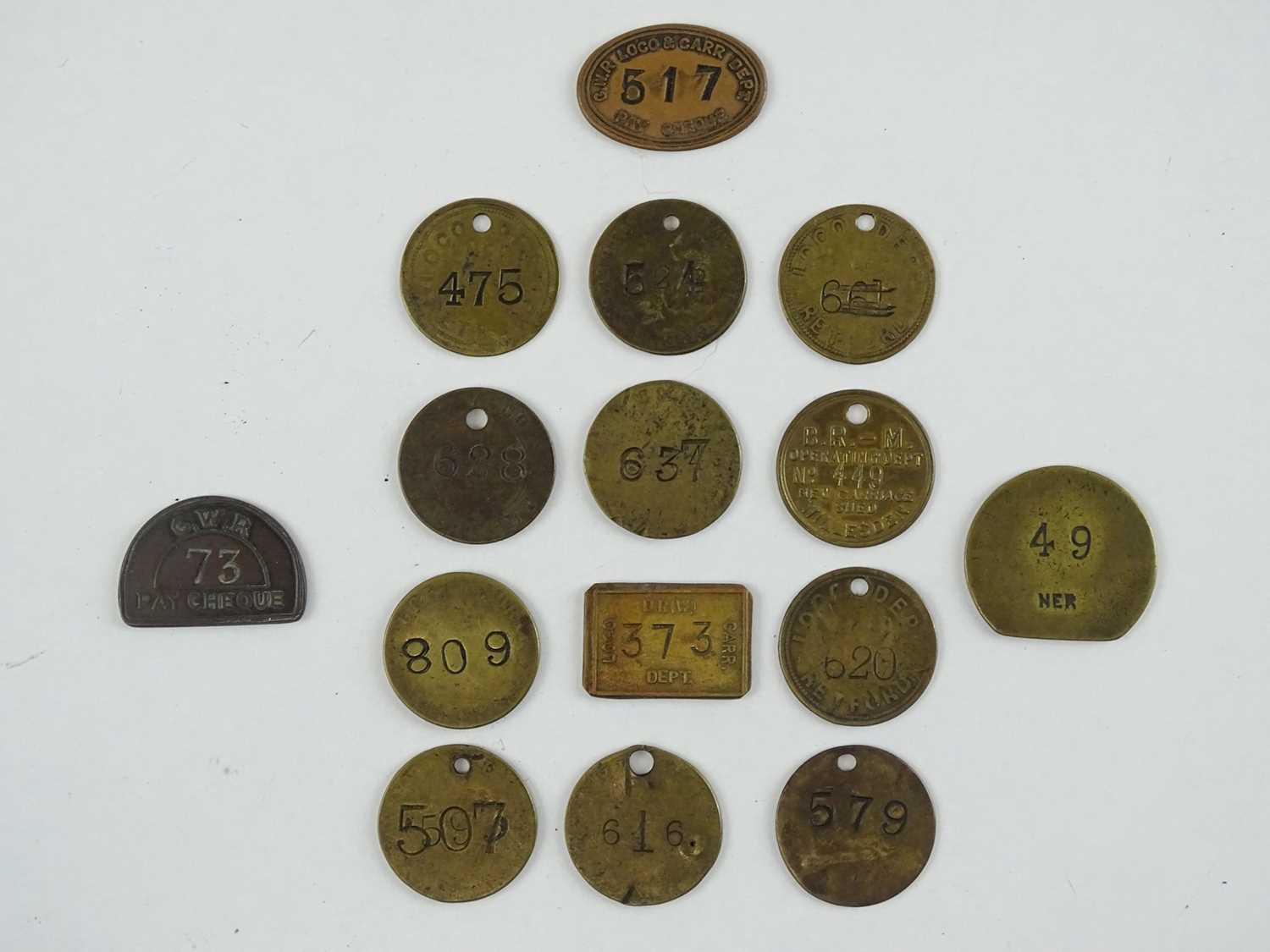 Lot 136 - A selection of brass Railway pay tokens from...