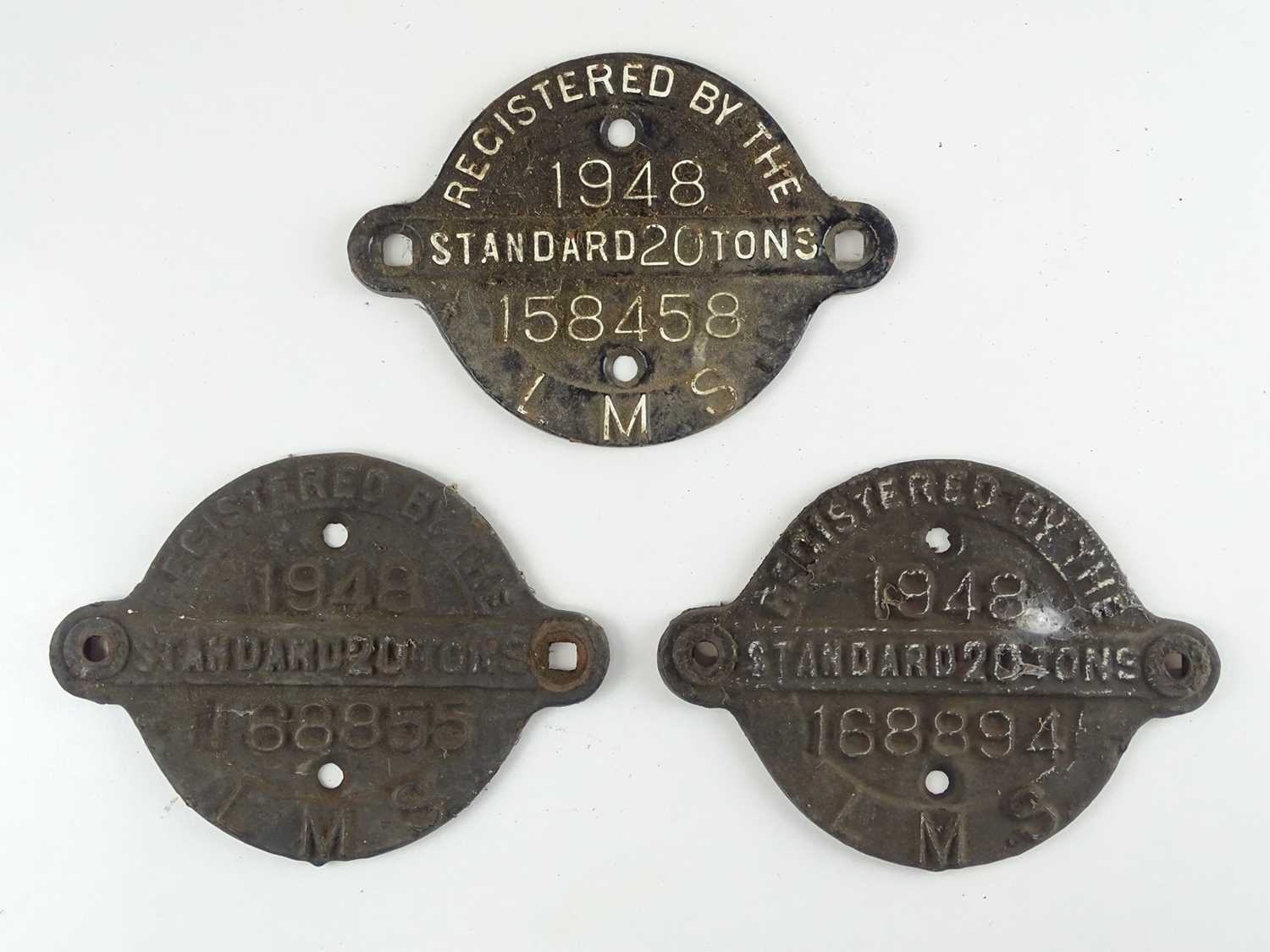 Lot 161 - A group of three LMS cast iron wagon plates...