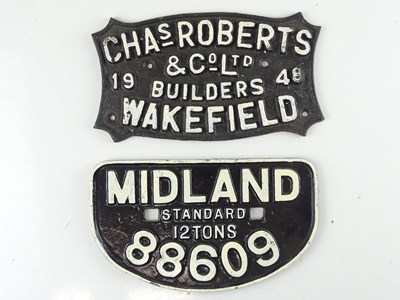Lot 166 - A pair of cast iron wagon plates one for...