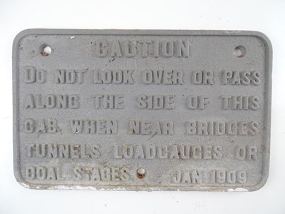 Lot 178 - A cast iron caution notice sign 'Do not look...