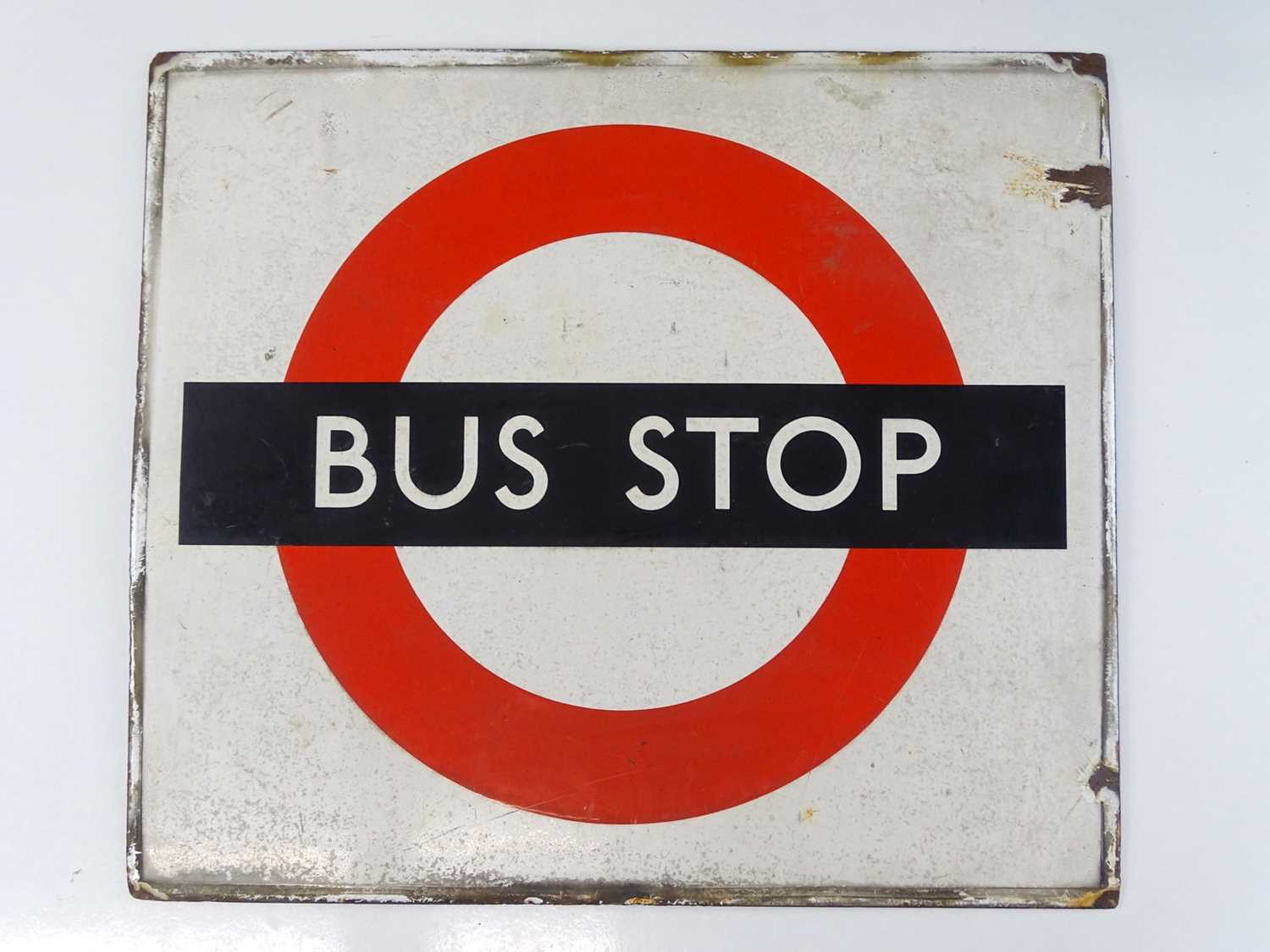 Lot 209 - A London Transport 'roundel' enamel bus stop...