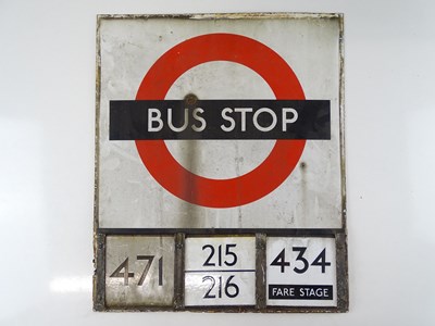 Lot 212 - A London Transport 'roundel' enamel bus stop...