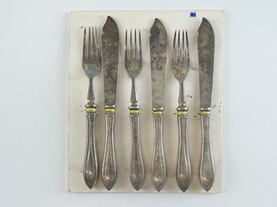 Lot 43 - A set of three pairs of silver plate fish...