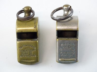 Lot 69 - A pair of Hudson's Patent Thunderer whistles -...