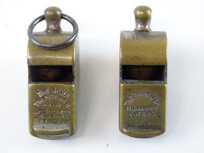 Lot 73 - A pair of Hudson's Patent Thunderer whistles -...