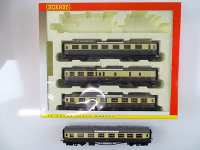 Lot 585 - A HORNBY R2025 Train Pack - missing loco but...