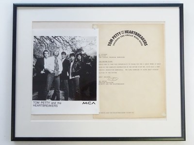 Lot 469 - TOM PETTY & THE HEARTBREAKERS: A 10"x8"...
