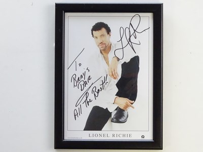 Lot 471 - LIONEL RITCHIE - A signed 10"x8" colour...