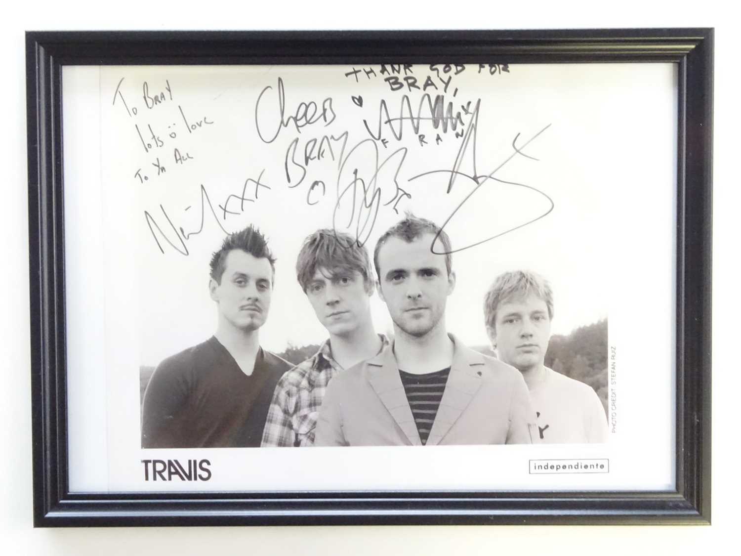 Lot 473 - TRAVIS: A signed 10"x8" colour photograph of...