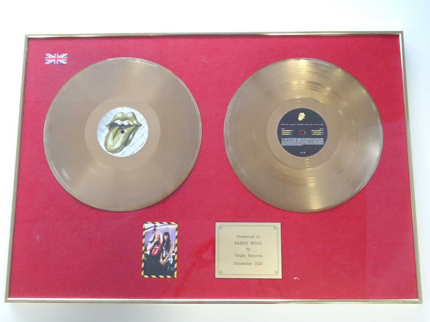 Lot 490 - THE ROLLING STONES - A pair of framed and...