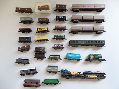 Lot 144 - A group of N Gauge wagons and a coach by...