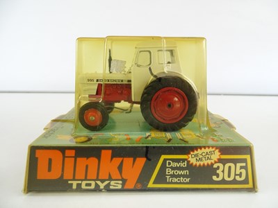 Lot 16 - A group of DINKY tractors comprising 305, 308...