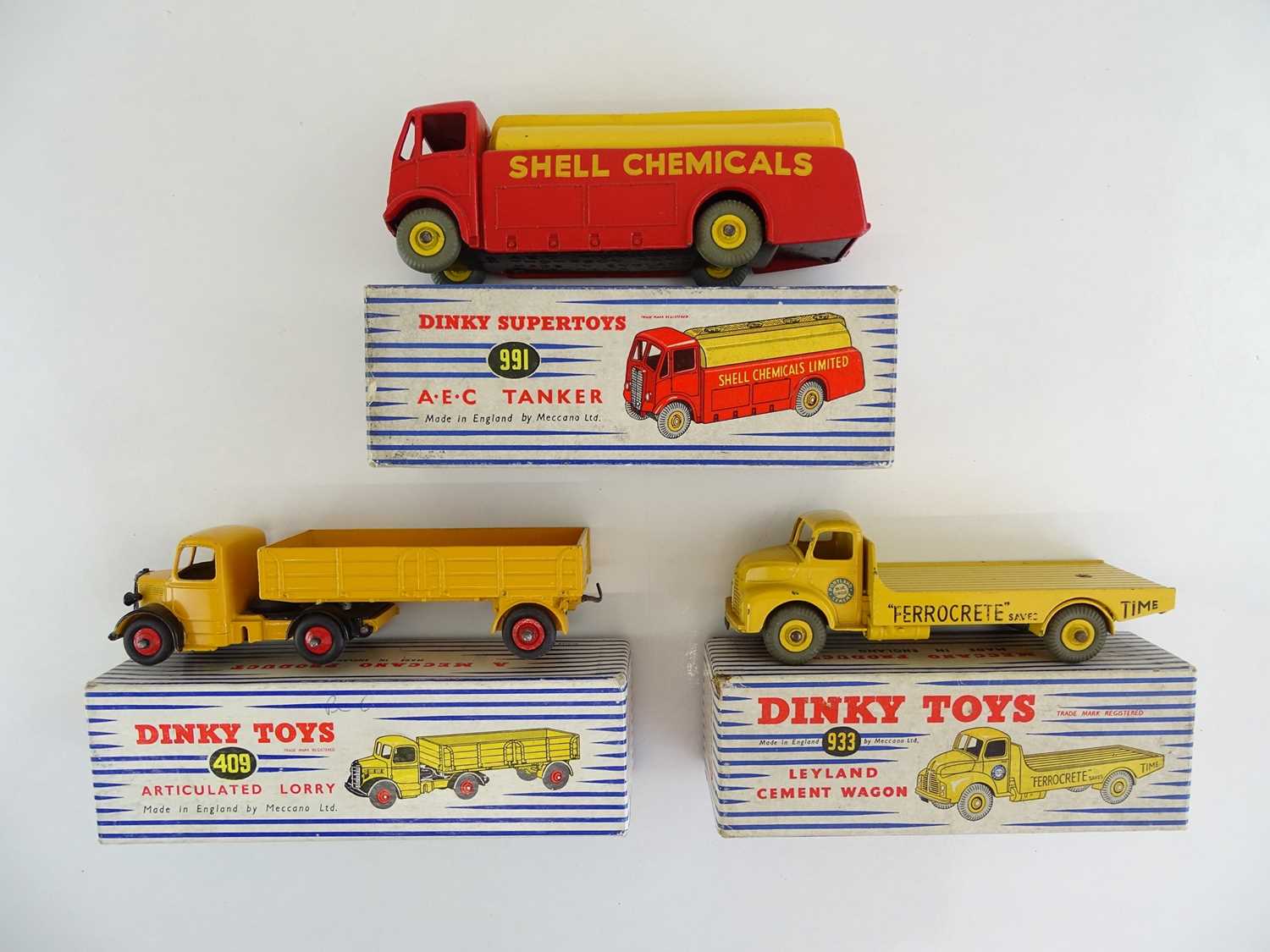 Lot 17 - A pair of DINKY lorries comprising 409 and 933...
