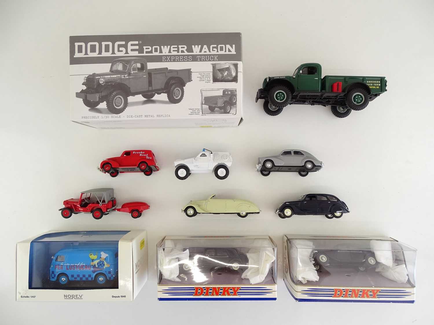 Lot 18 - A group of diecast cars and vans by NOREV,...